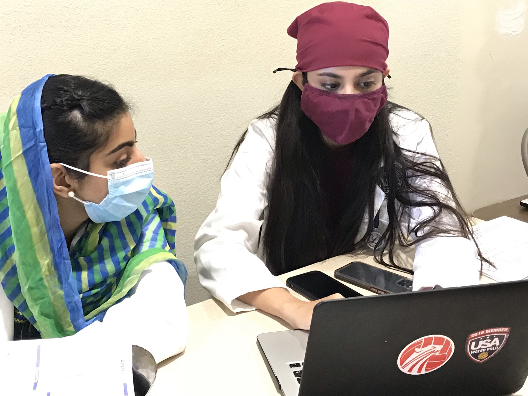 Student volunteers registering patients